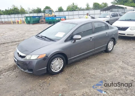 2010 Honda Civic Hybrid from USA, damaged, VIN JHMFA3F2XAS003400